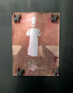 Portrait of Paul Bocuse with his two dogs on the door of my refrigerator