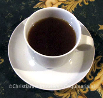 Strong, reduced clair oxtail comsommé is served in small bowls or, like on this picture, in a teacup