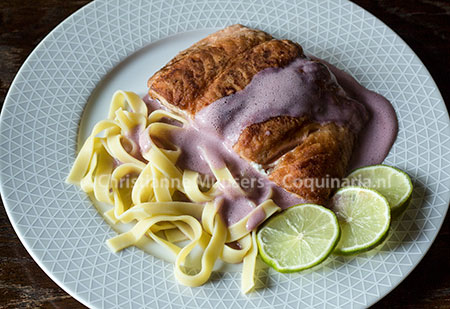 Salmon with red-wine-sauce. The pasta is not authentic..